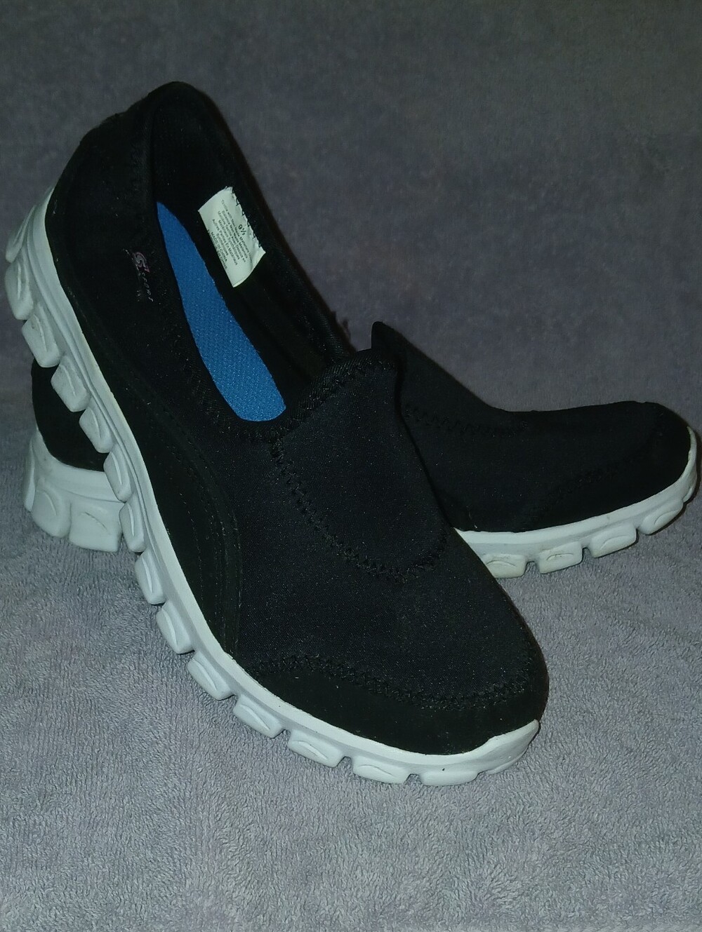 Black Sketchers S Sport Slip-On Sneakers with Blue Insole